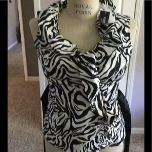 Pretty, ruffly, sleeveless blouse